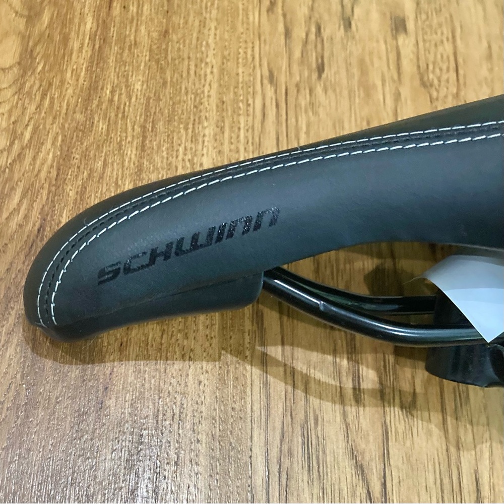 {SCHWINN} black with white stitching slim bike seat brand new never used